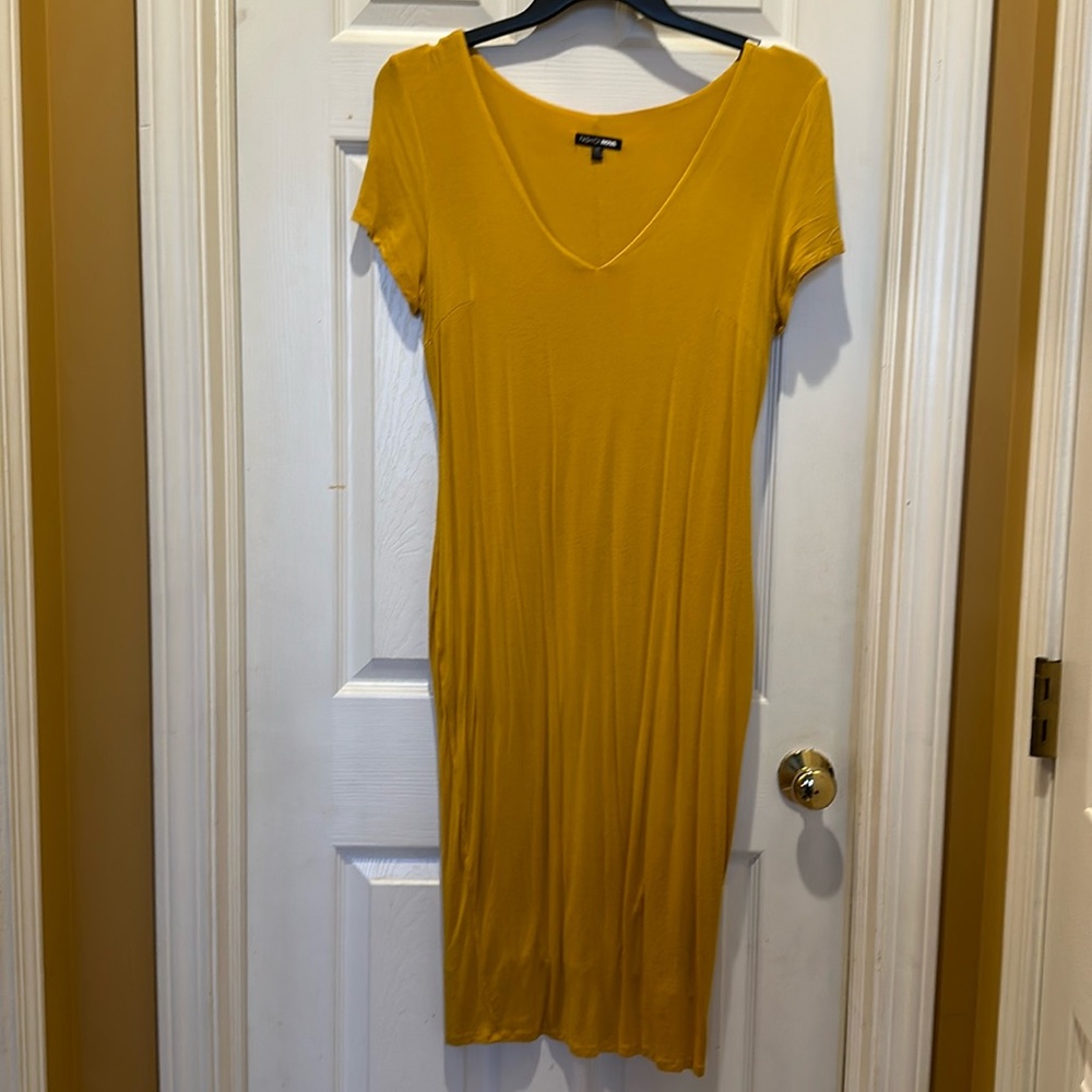 Yellow knee length body con dress
